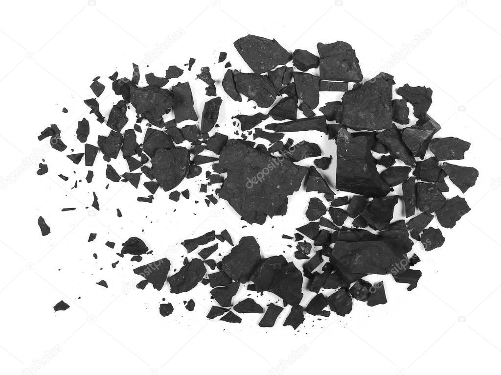 pile black coal isolated on white texture, top view