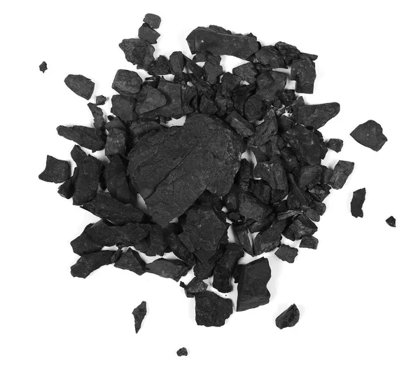 Stapel schwarze Kohle isoliert auf weißem Hintergrund, Ansicht von oben — Stockfoto