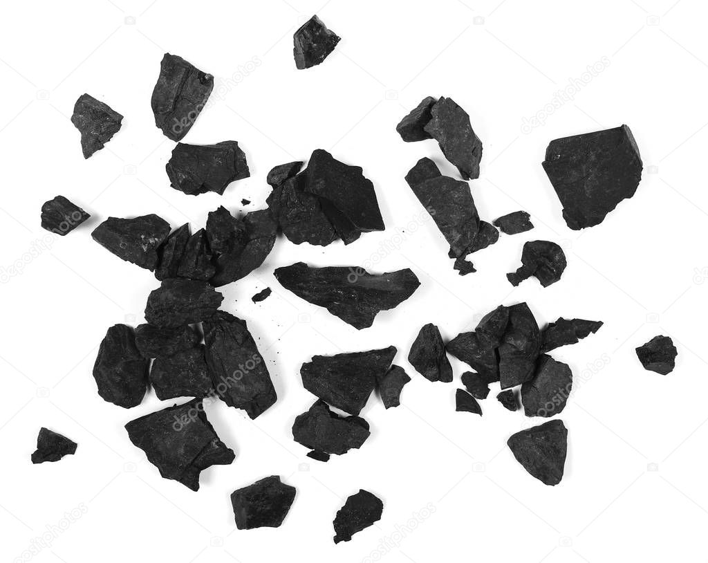 pile black coal isolated on white background, top view