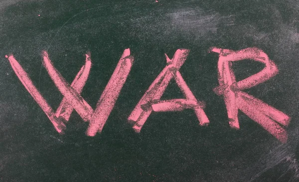 Word war on chalkboard, blackboard texture — Stock Photo, Image