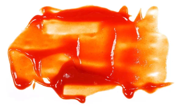 Ketchup vermelho espirra isolado no fundo branco, textura pura de tomate, vista superior — Fotografia de Stock
