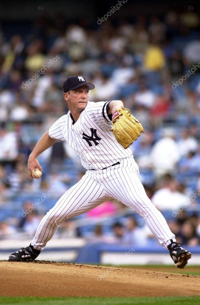 David Cone of the New York Yankees pitching at Yankees Stadium the Bronx.