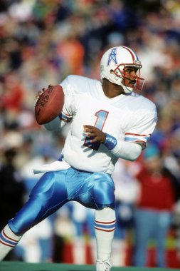 Warren Moon oyun kurucu Houston Oilers oyun eylem için