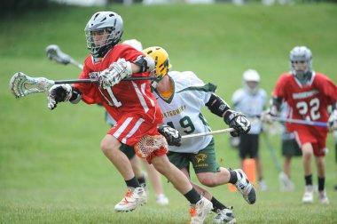 Youth lacrosse and High School Lacrosse action in games played in Central New Jersey. clipart