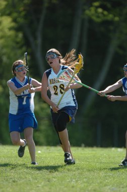 Kızlar lise Lacrosse oyunu at eylem yerel okul Merkezi New Jersey.
