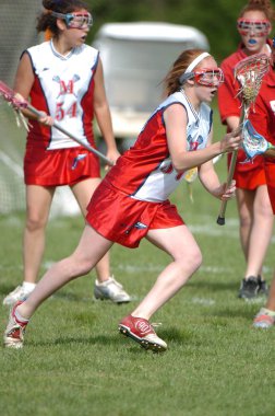 Kızlar lise Lacrosse oyunu at eylem yerel okul Merkezi New Jersey.