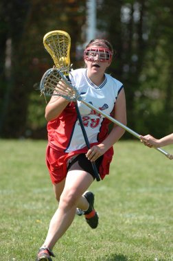 Kızlar lise Lacrosse oyunu at eylem yerel okul Merkezi New Jersey.