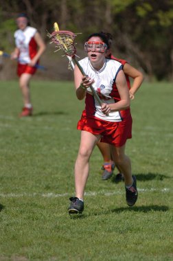 Kızlar lise Lacrosse oyunu at eylem yerel okul Merkezi New Jersey.