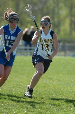 Kızlar lise Lacrosse oyunu at eylem yerel okul Merkezi New Jersey.