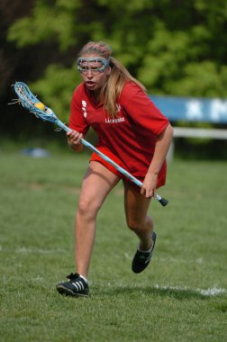 Kızlar lise Lacrosse oyunu at eylem yerel okul Merkezi New Jersey.