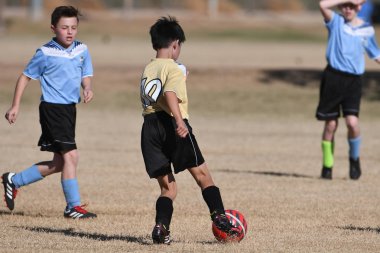 ABD 'nin güneybatısındaki 8-10 yaş arası çocuklar arasında futbol maçı var..