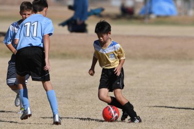 ABD 'nin güneybatısındaki 8-10 yaş arası çocuklar arasında futbol maçı var..