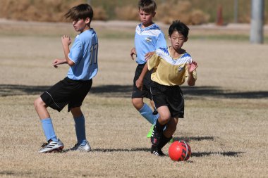 ABD 'nin güneybatısındaki 8-10 yaş arası çocuklar arasında futbol maçı var..