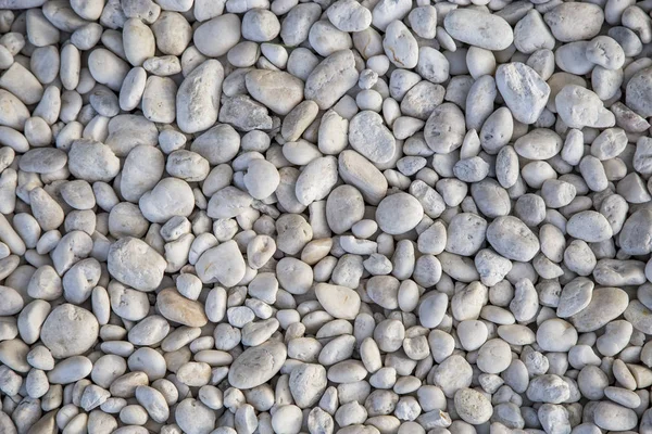 Pilha de pedras de seixo para fundo — Fotografia de Stock