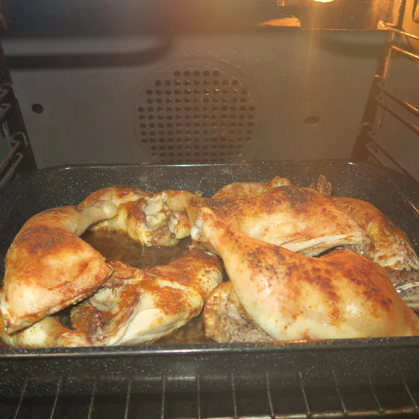 Chicken thighs spiced in the oven — Stock Photo, Image