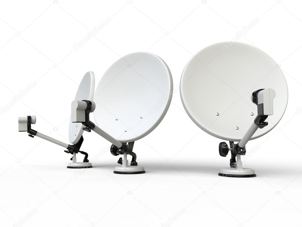 Three white TV satellite dishes - studio shot