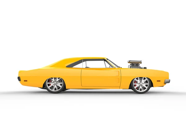 Винтажный желтый мышечный автомобиль - вид сбоку — стоковое фото