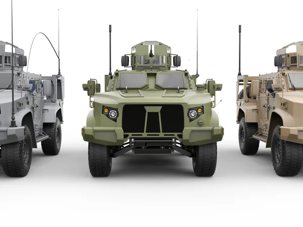 Three military all terrain vehicles - front view closeup shot — Stock fotografie