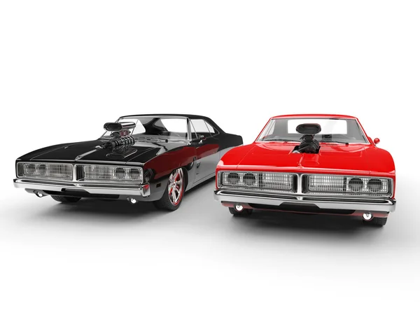 Black and red vintage muscle cars - studio shot — Stock Photo, Image