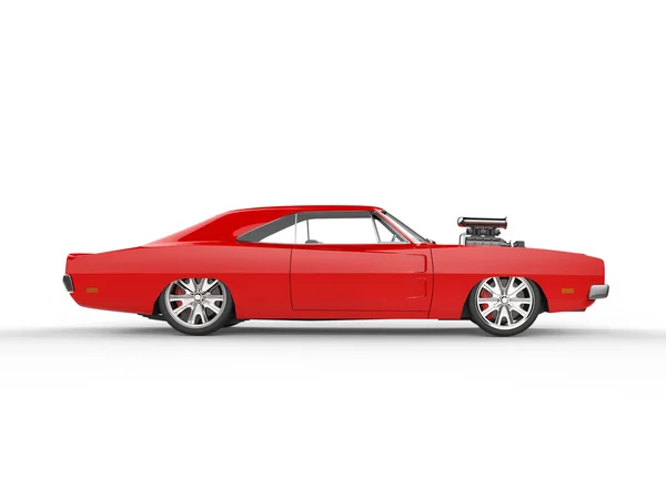 Vintage red muscle car - side view — Stock fotografie