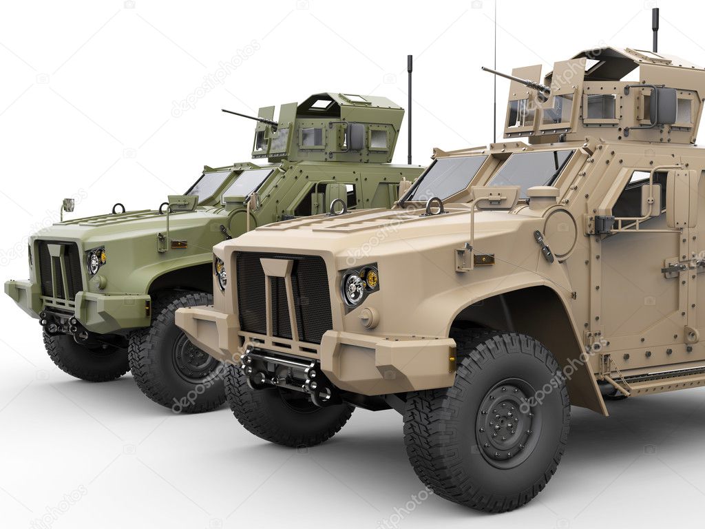 Two military all terrain light armor tactical vehicles - hood closeup shot