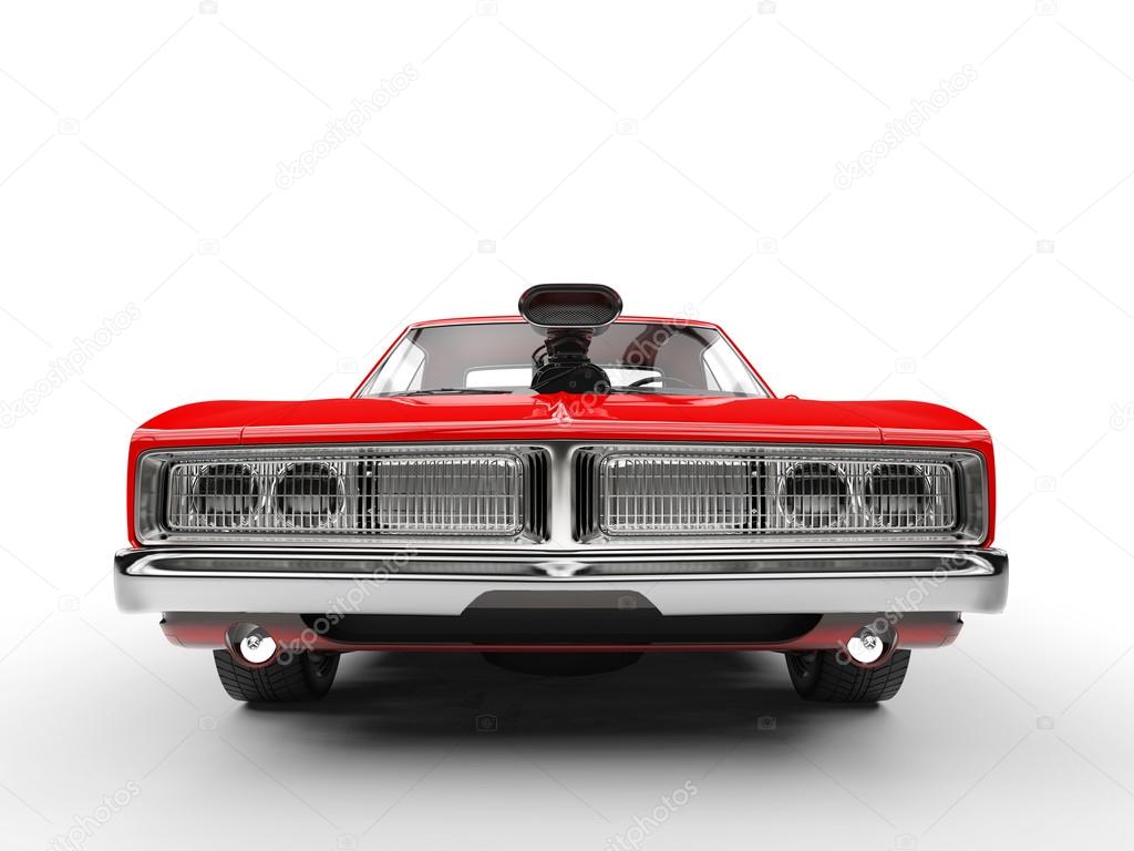 Awesome red muscle car - front view extreme closeup shot
