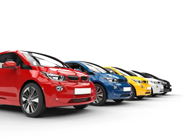 Řada malých elektrických automobilů - různé barvy — Stock fotografie