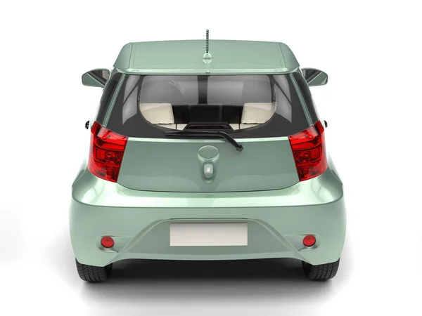 Pastel verde pequeno carro compacto urbano - vista cauda — Fotografia de Stock