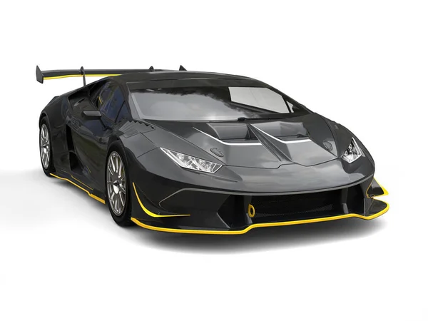 Чёрный быстрый гоночный автомобиль с жёлтыми деталями — стоковое фото