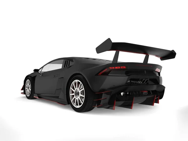 Matte black sports car with red details - back view — Stock Photo, Image