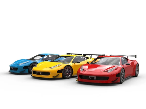 Nowoczesny, luksusowy sportscars czerwony, żółty i niebieski - strzał studio — Zdjęcie stockowe