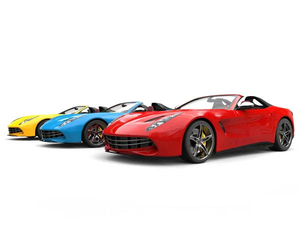 Red, blue and yellow modern convertible sports cars - beauty shot — Stock Photo, Image