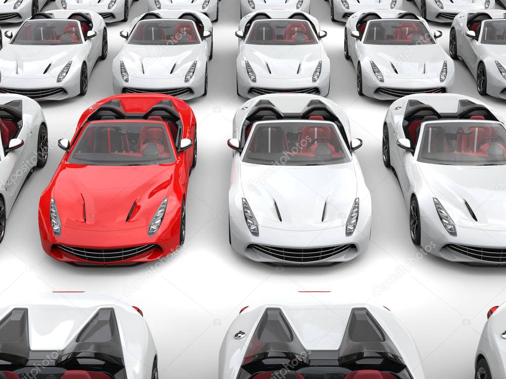 Fiery red sports car stands out from the crowd of white sports cars