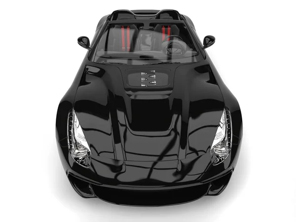 Shiny black modern convertible super sports car - top down headlight close seup shot — стоковое фото