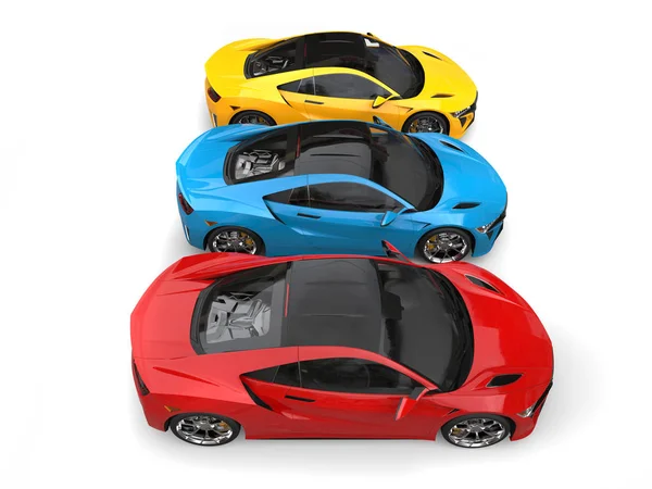 Super coches deportivos en colores primarios - vista de arriba hacia abajo — Foto de Stock
