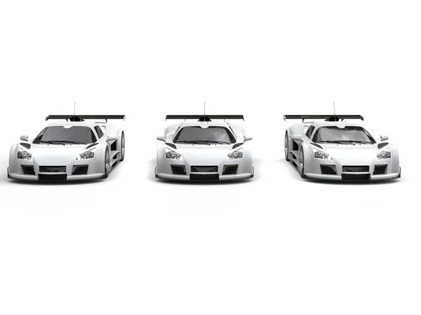 Three white great racing cars - front view — Stock Photo, Image