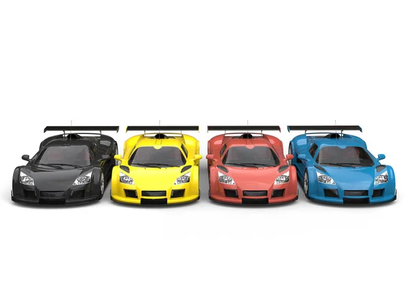 Row of supercars in red, yellow, blue and black — Stock Photo, Image