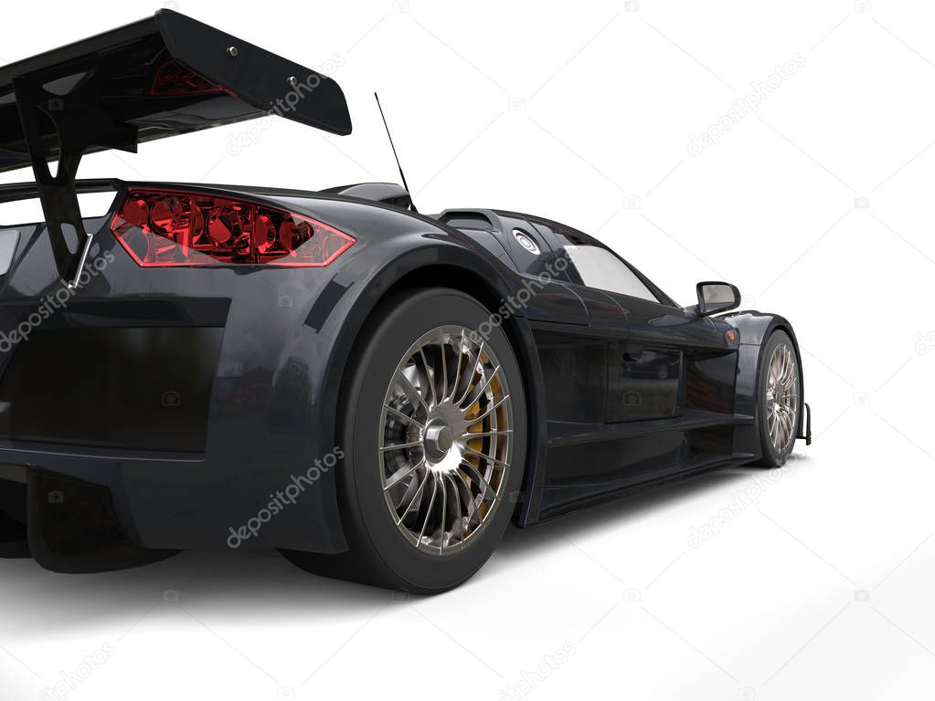 Dark gray racing supercar - tail view