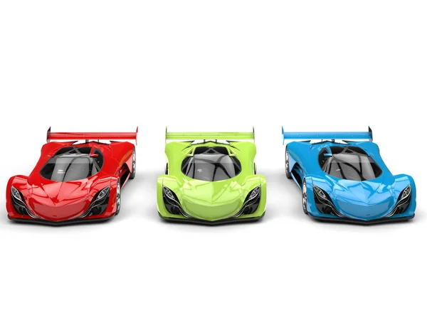 Vörös, zöld és kék félelmetes modern szuper koncepció autók - elölnézet — Stock Fotó