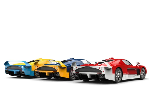Striking concept sports cars in red, blue and yellow colors - rear end view — Stock Photo, Image