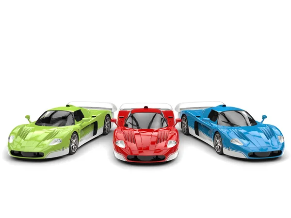 Conceito impressionante super carros em vermelho, verde e azul cores base com detalhes brancos vista superior — Fotografia de Stock