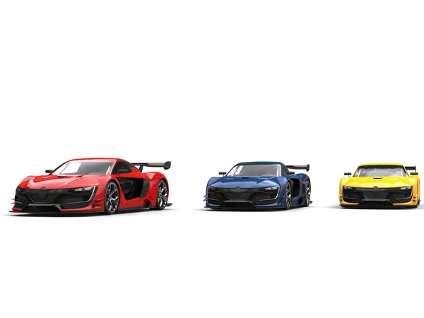 Cool super sports cars side by side - red, blue and yellow — Stock Photo, Image