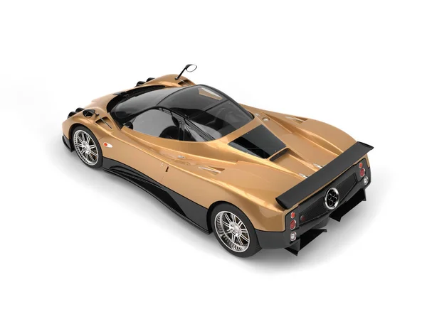 Gold leaf painted super car with shiny black panels - top down back view — Stock Photo, Image