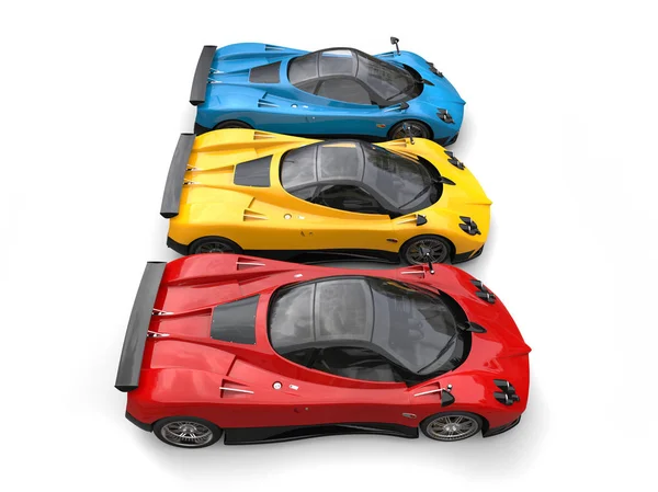 Red, yellow and blue awesome super cars - top side view — Stock Photo, Image