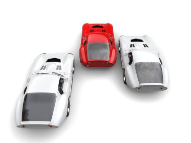 Kırmızı ve beyaz vintage yarış arabaları - yarışı önde gelen kırmızı - arkadan görünüm