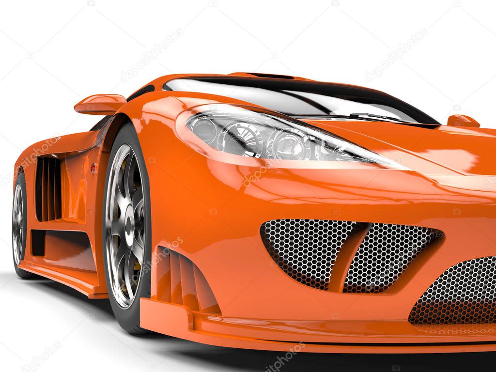 Tangerine orange modern super sports car - headlight extreme closeup shot