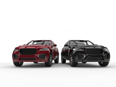 Kırmızı ve siyah modern SUV yan yana