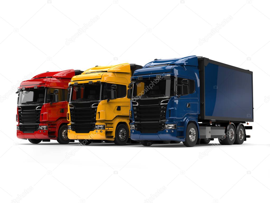 Heavy transport trucks - red, blue and yellow - beauty shot