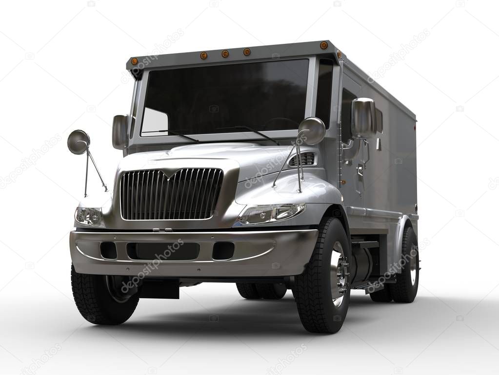 Silver armored cash transport truck - front closeup shot