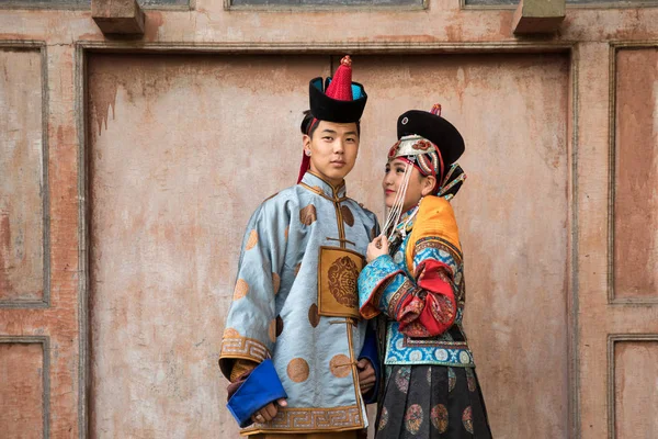 Couple in traditional Mongolian outfit.